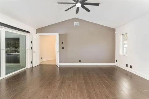 a bathroom with a shower and a toilet