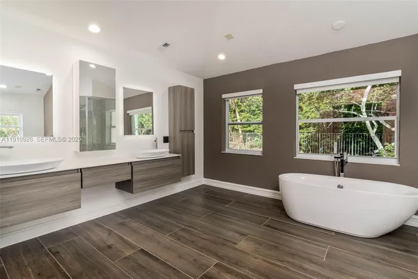 a bathroom with a sink and a bathtub