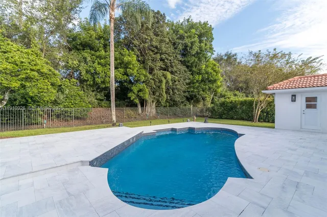 a view of outdoor space yard swimming pool and patio