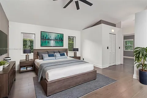 a view of walk in closet with clothes