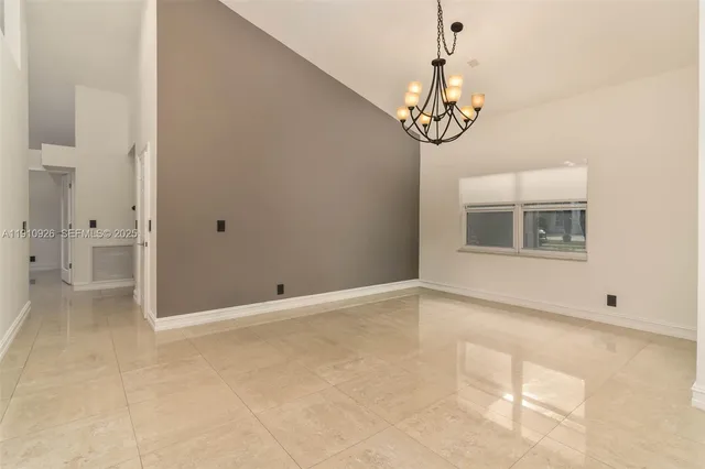 a view of an empty room with window