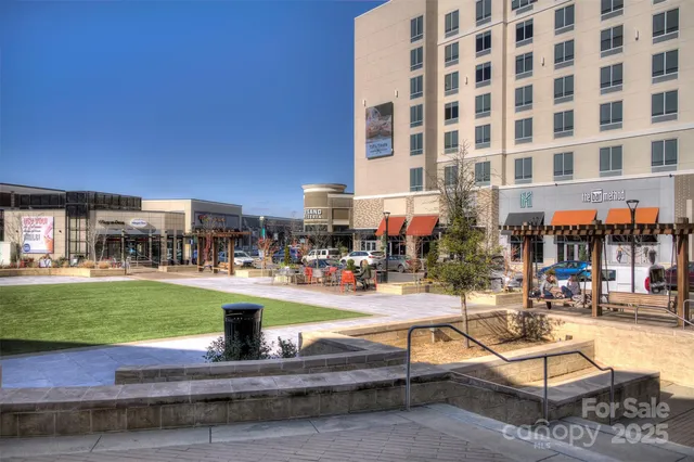 a view of a cafe with sitting area