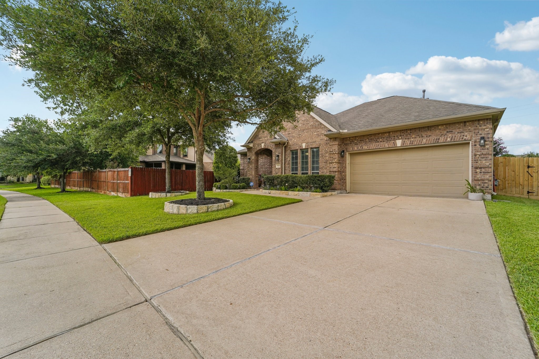 3511 Winding Point Lane Katy, TX 77494 - Photo 2 of 35 a front view of house with yard and green space