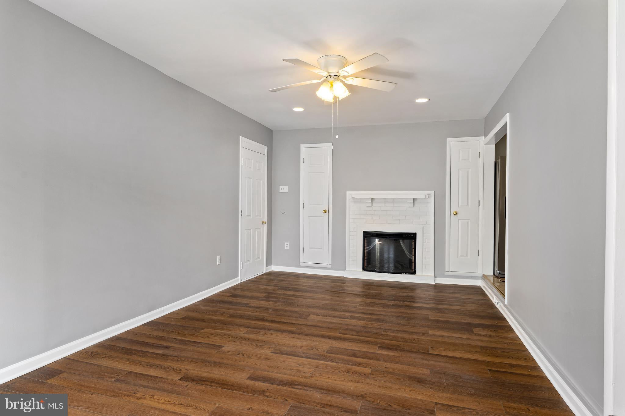 10 North Hills Drive Rising Sun, MD 21911 - Photo 12 of 28 a view of a livingroom with wooden floor and a ceiling fan