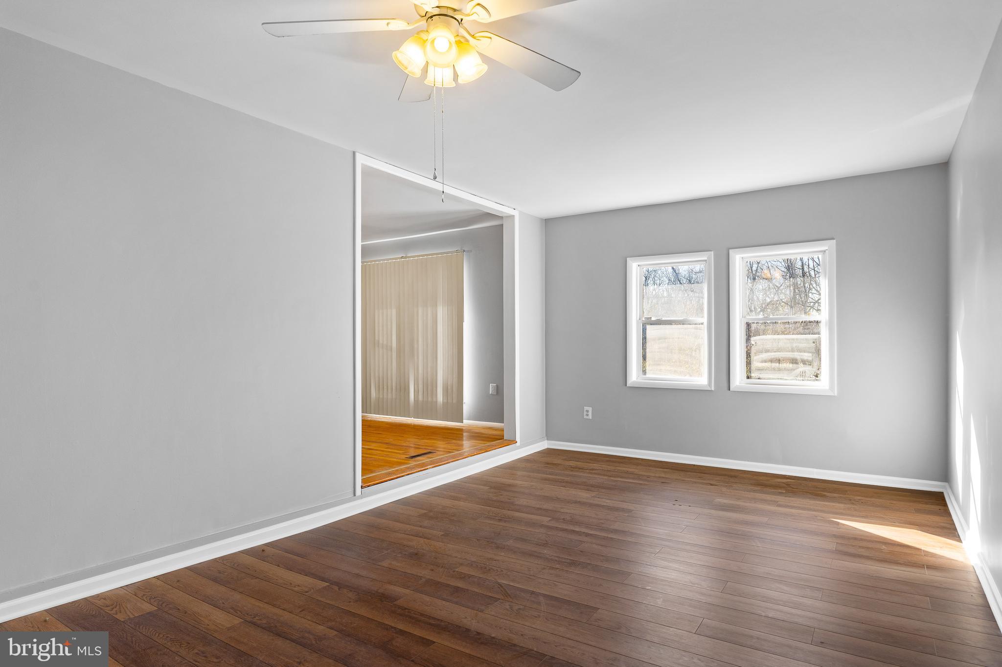10 North Hills Drive Rising Sun, MD 21911 - Photo 13 of 28 an empty room with wooden floor and windows