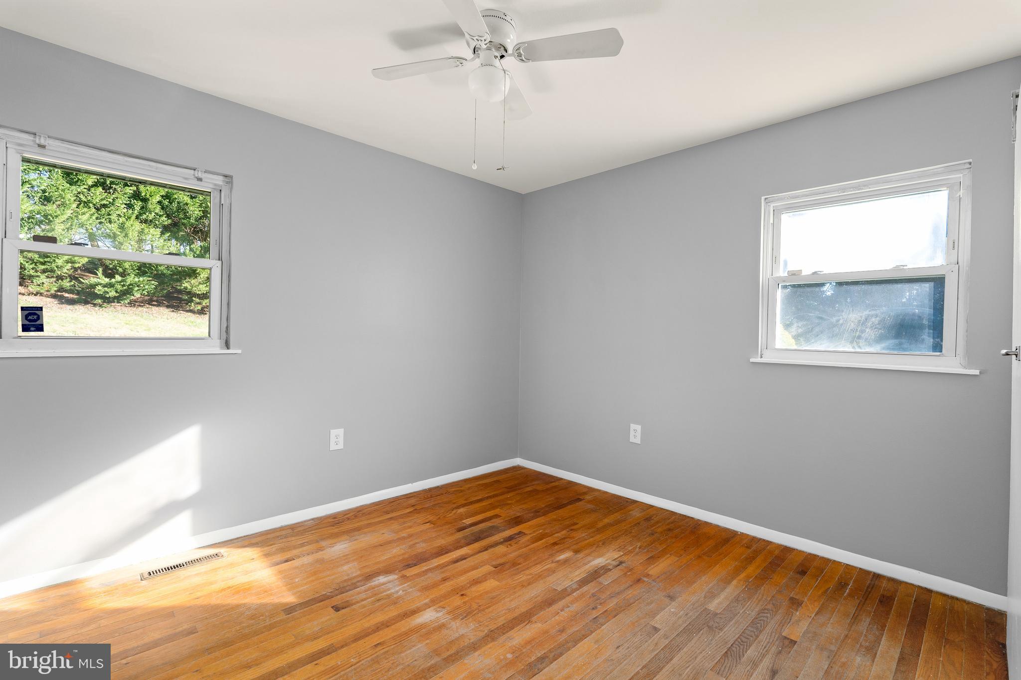 10 North Hills Drive Rising Sun, MD 21911 - Photo 22 of 28 a view of empty room with wooden floor and fan