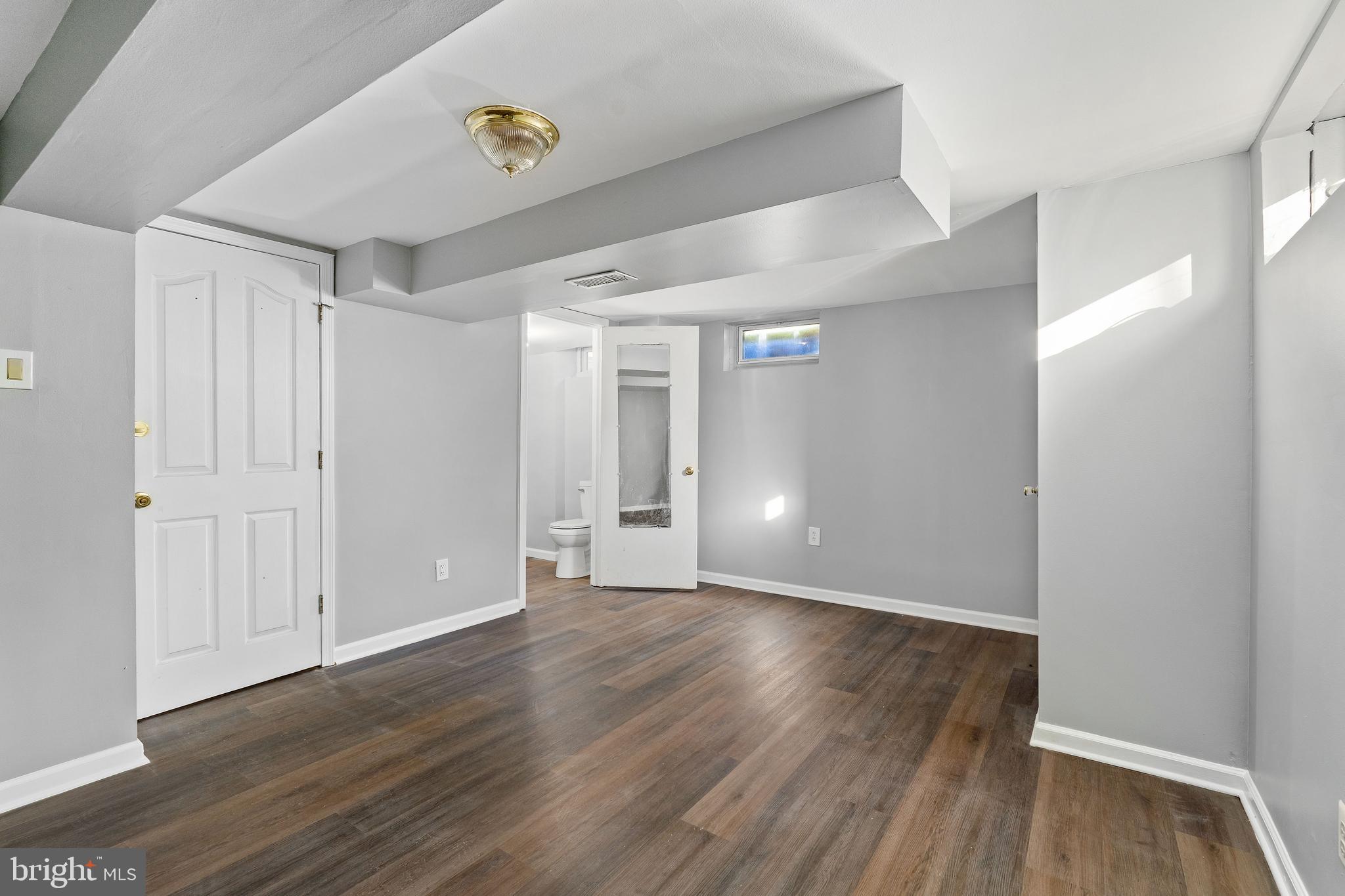 10 North Hills Drive Rising Sun, MD 21911 - Photo 24 of 28 a view of an empty room with wooden floor
