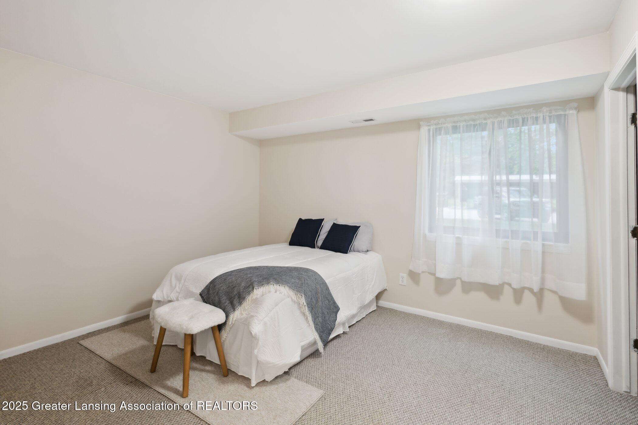 1725 Maple Ridge Road, Unit 60 Haslett, MI 48840 - Photo 10 of 16 primary bed
