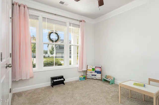 a kitchen with stainless steel appliances kitchen island a refrigerator a stove a sink and a cabinets