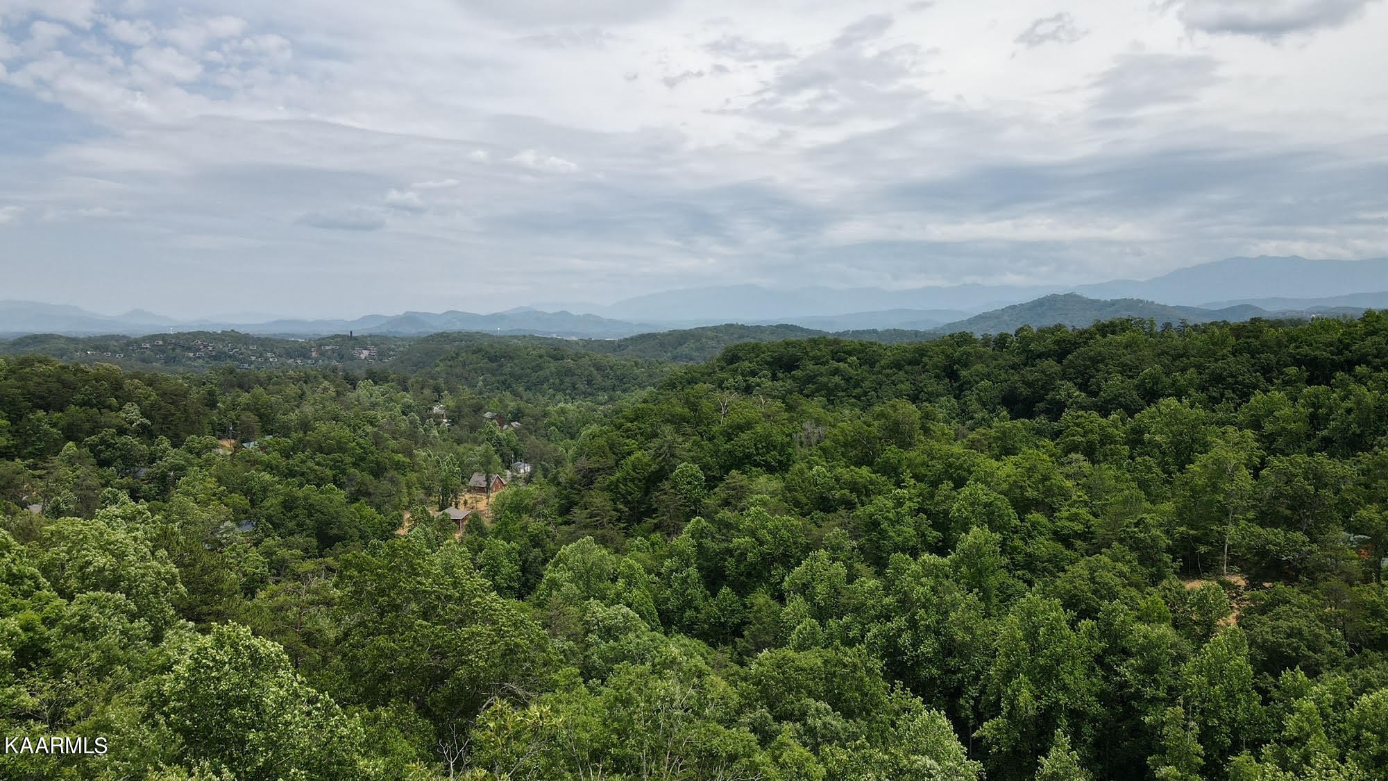 110 Bluff Ridge Road Sevierville, TN 37876 - Photo 5 of 10 an aerial view of houses covered in trees