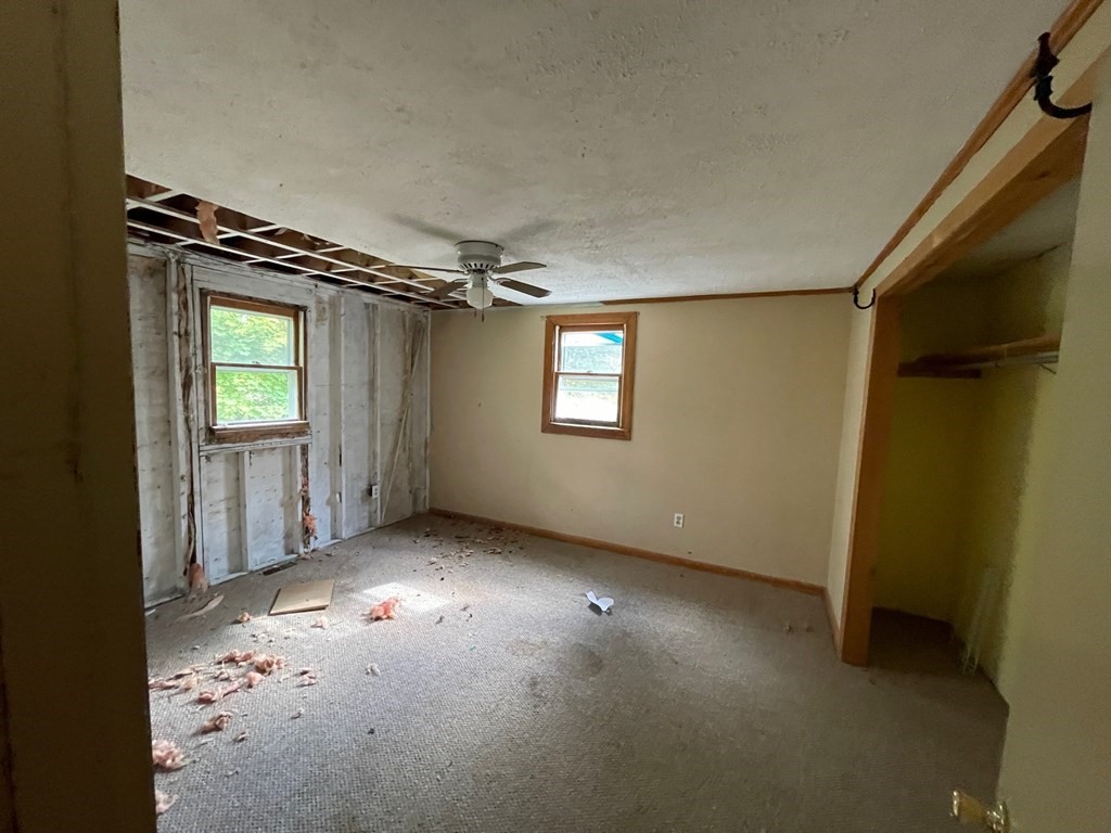 65 Beacon Street Melrose, MA 02176 - Photo 11 of 13 an empty room with windows