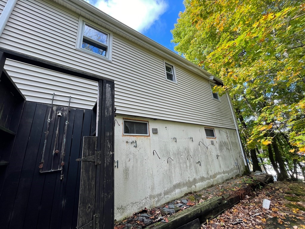 65 Beacon Street Melrose, MA 02176 - Photo 4 of 13 a backyard of a house