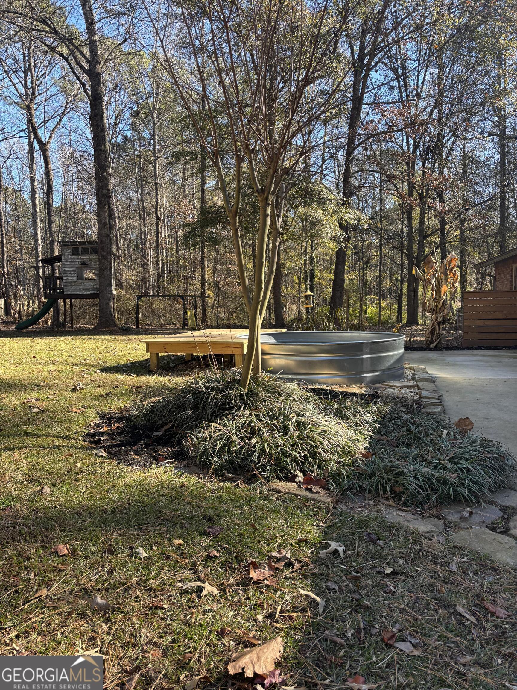 14 Emory Street Newnan, GA 30265 - Photo 23 of 27 a view of a yard with large trees