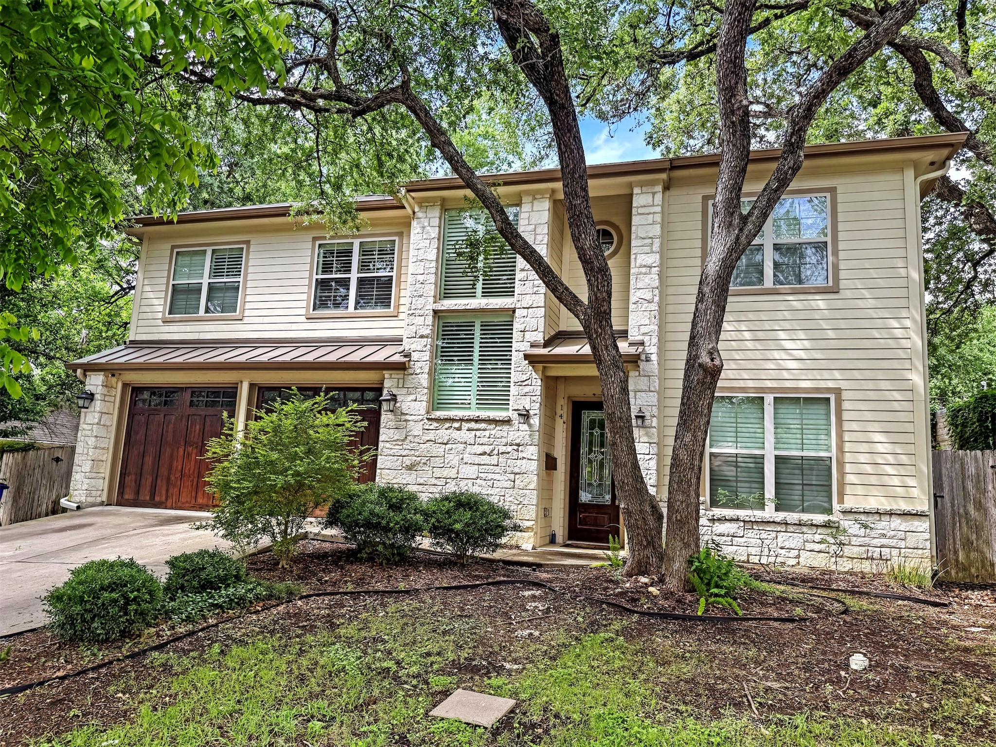 14 Scott Crescent Austin, TX 78703 - Photo 6 of 6 a front view of a house with garden