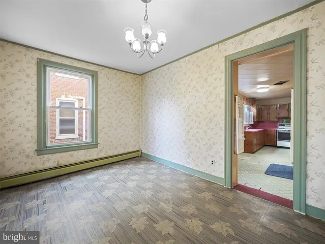 a view of a room with a large windows