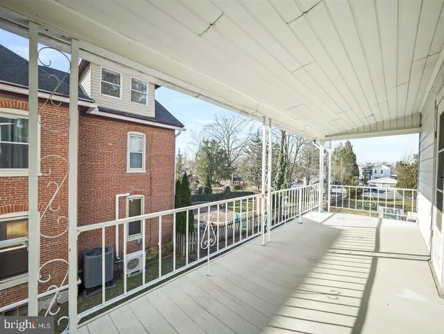 a balcony with furniture