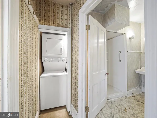 a view of bathroom with a toilet and a shower