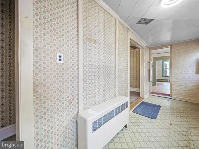 a bathroom with a shower and a bathtub