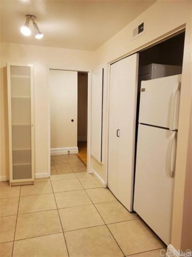 6701 Paseo Del Norte, Unit E Carlsbad, CA 92011 - Photo 3 of 23 a view of an empty room with a bathroom