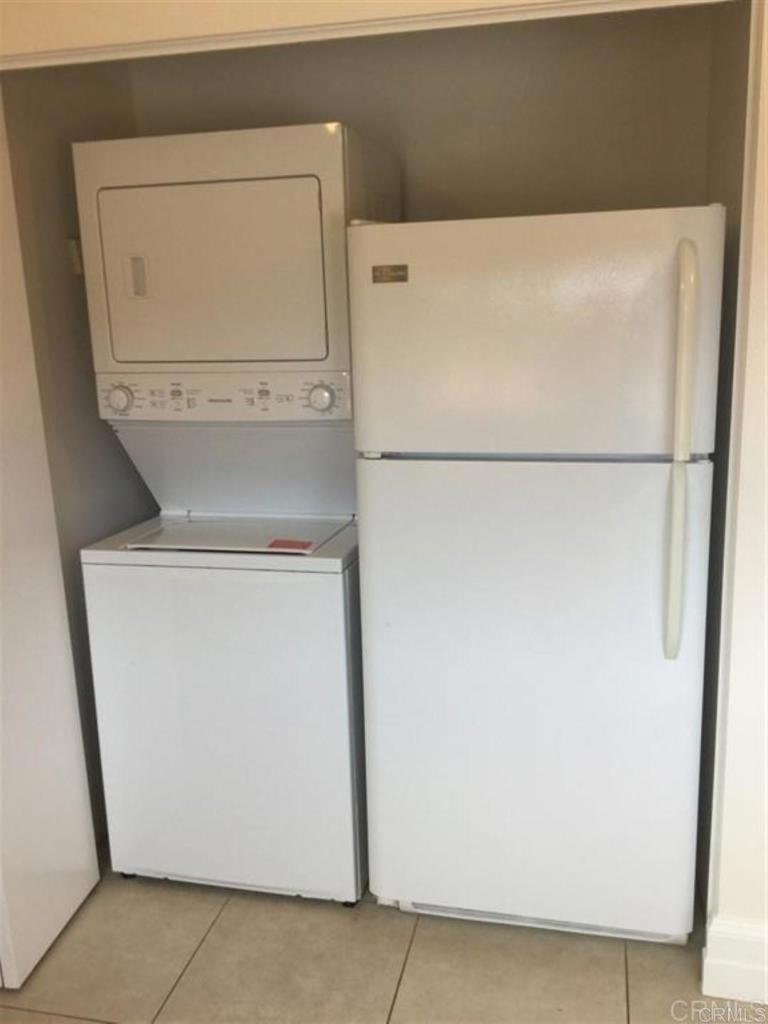 6701 Paseo Del Norte, Unit E Carlsbad, CA 92011 - Photo 8 of 23 a close up view of a washer and dryer