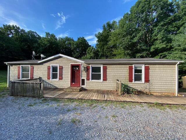 208 Board Mountain Road Goodview, VA 24095 - Photo 2 of 11 a view of a house with a yard