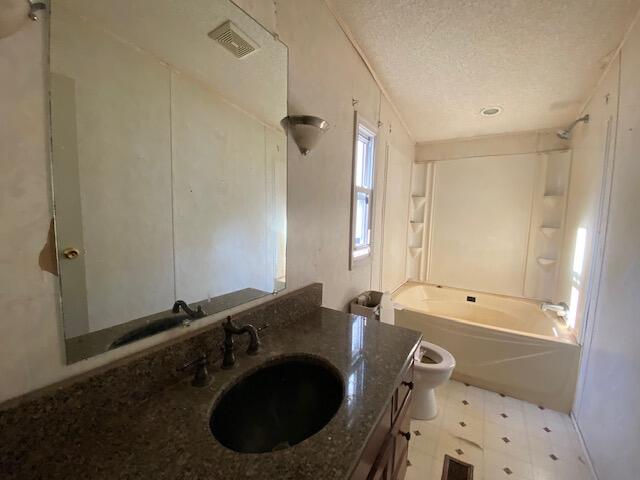 208 Board Mountain Road Goodview, VA 24095 - Photo 5 of 11 a bathroom with a sink a toilet and shower