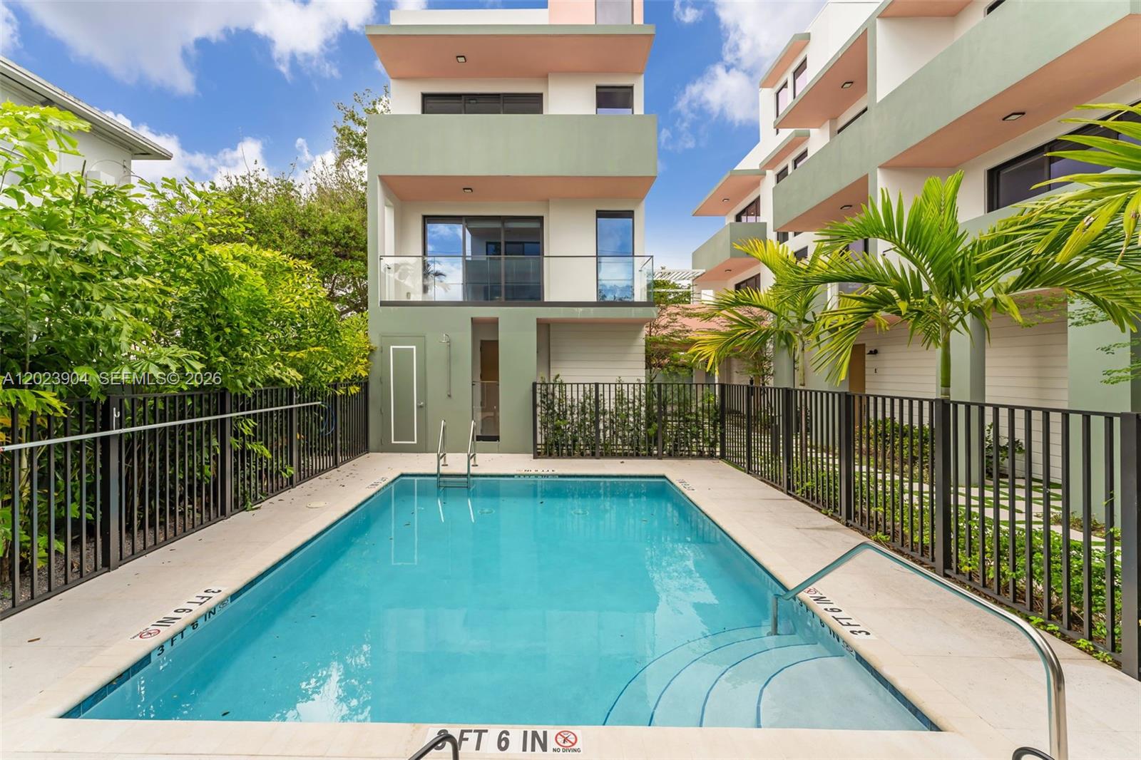 721 Southwest 11th Street, Unit G Miami, FL 33129 - Photo 40 of 40 a balcony with view of palm trees