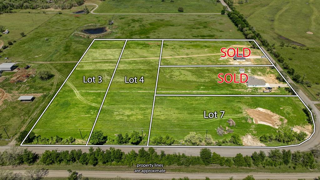 Lot 4-5 Lamkin Road Mineral Wells, TX 76067 - Photo 1 of 10 a view of a tennis court