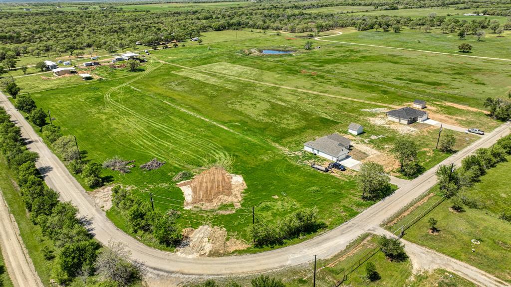 Lot 4-5 Lamkin Road Mineral Wells, TX 76067 - Photo 6 of 10 a view of a garden with an outdoor space