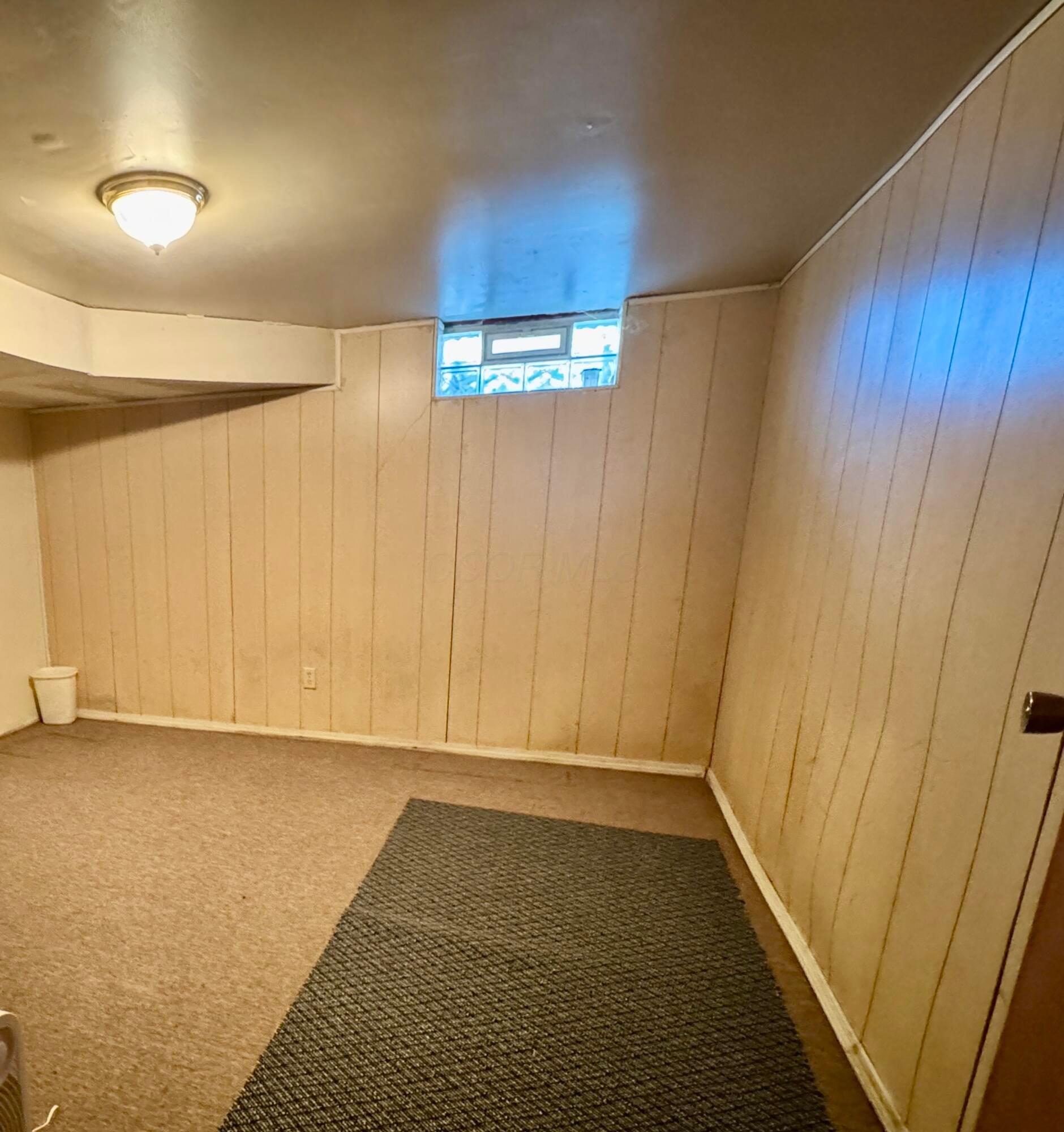 2666 Arcola Road Columbus, OH 43207 - Photo 14 of 22 Finished basement with vented glass block