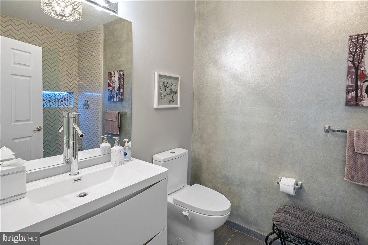 103 Kyle Way Ewing, NJ 08628 - Photo 16 of 23 Remodeled Primary bath with European, floating sin