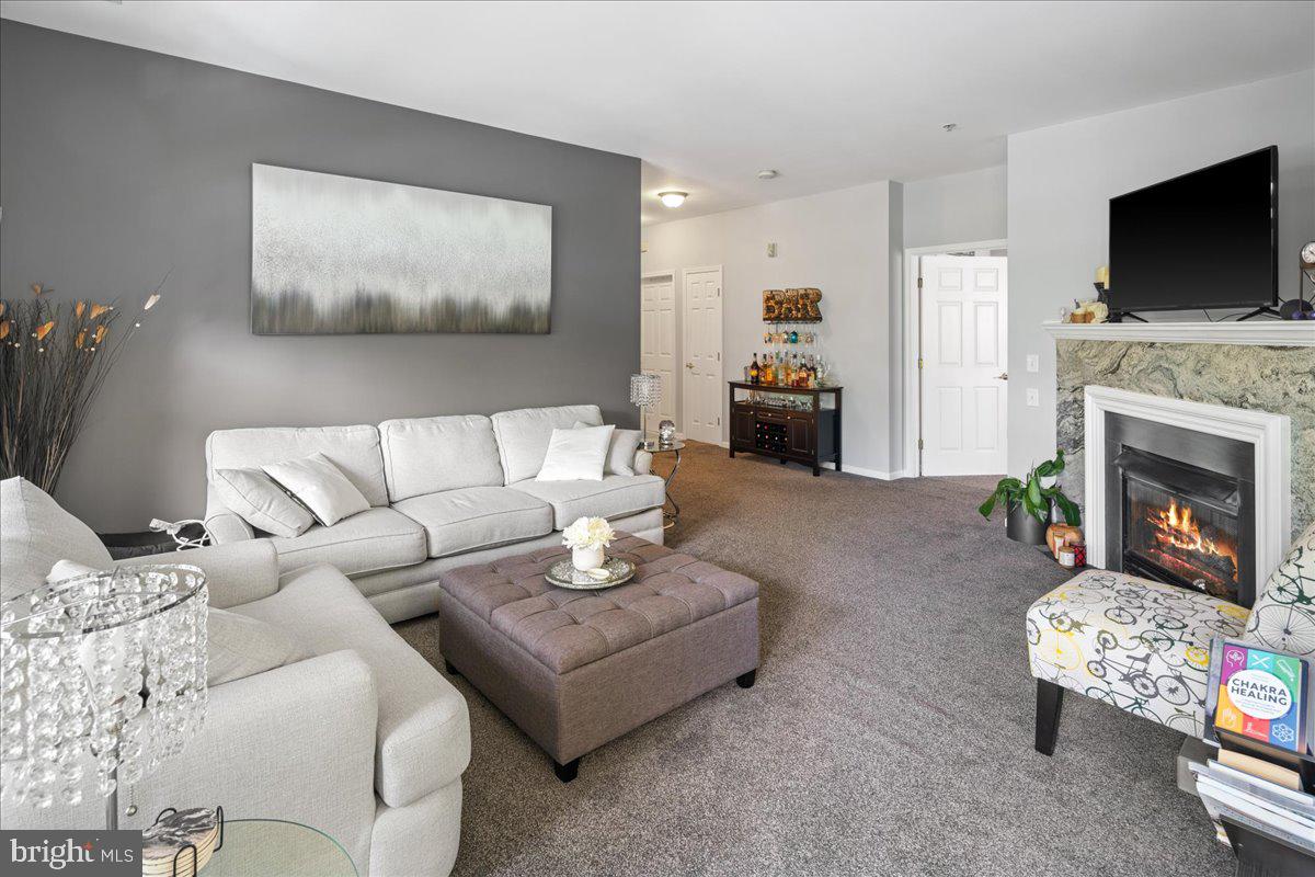 103 Kyle Way Ewing, NJ 08628 - Photo 2 of 23 Living Room and gas fireplace