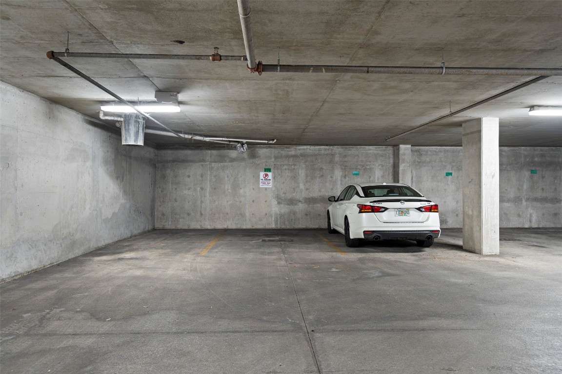 1900 Barton Springs Road, Unit 5027 Austin, TX 78704 - Photo 17 of 28 a view of parking garage with cars