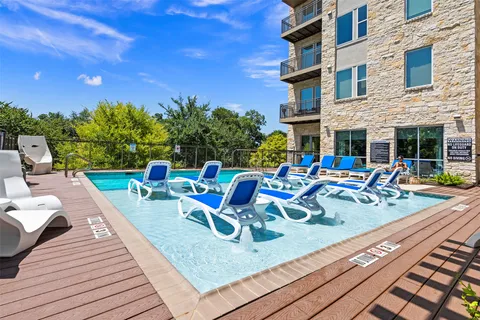 a view of a chairs and tables in the patio