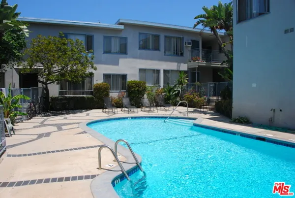 a view of a house with swimming pool