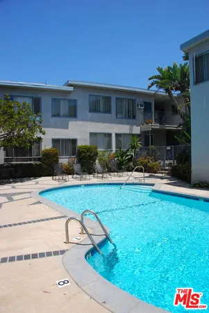 a front view of a house with swimming pool