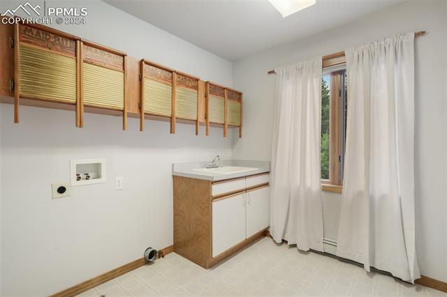 4735 Red Forest Road Monument, CO 80132 - Photo 31 of 50 Main floor laundry