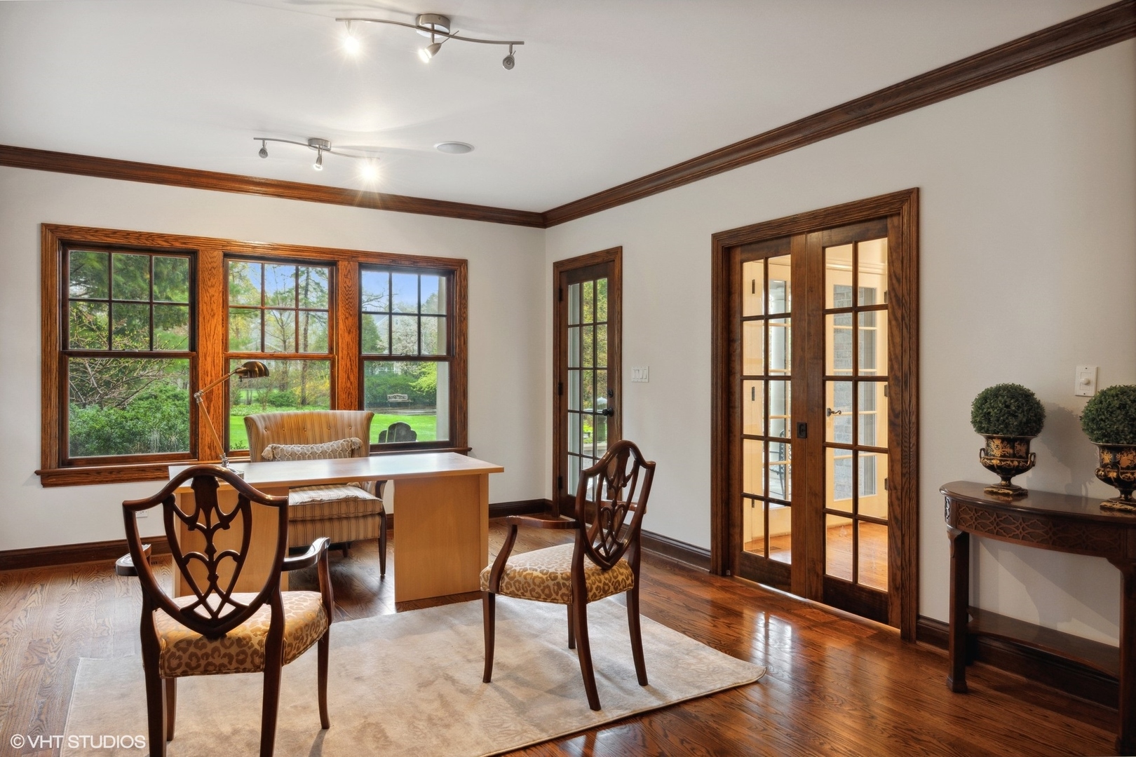 1111 Seneca Road Wilmette, IL 60091 - Photo 15 of 50 a view of a dining room with furniture window and wooden floor