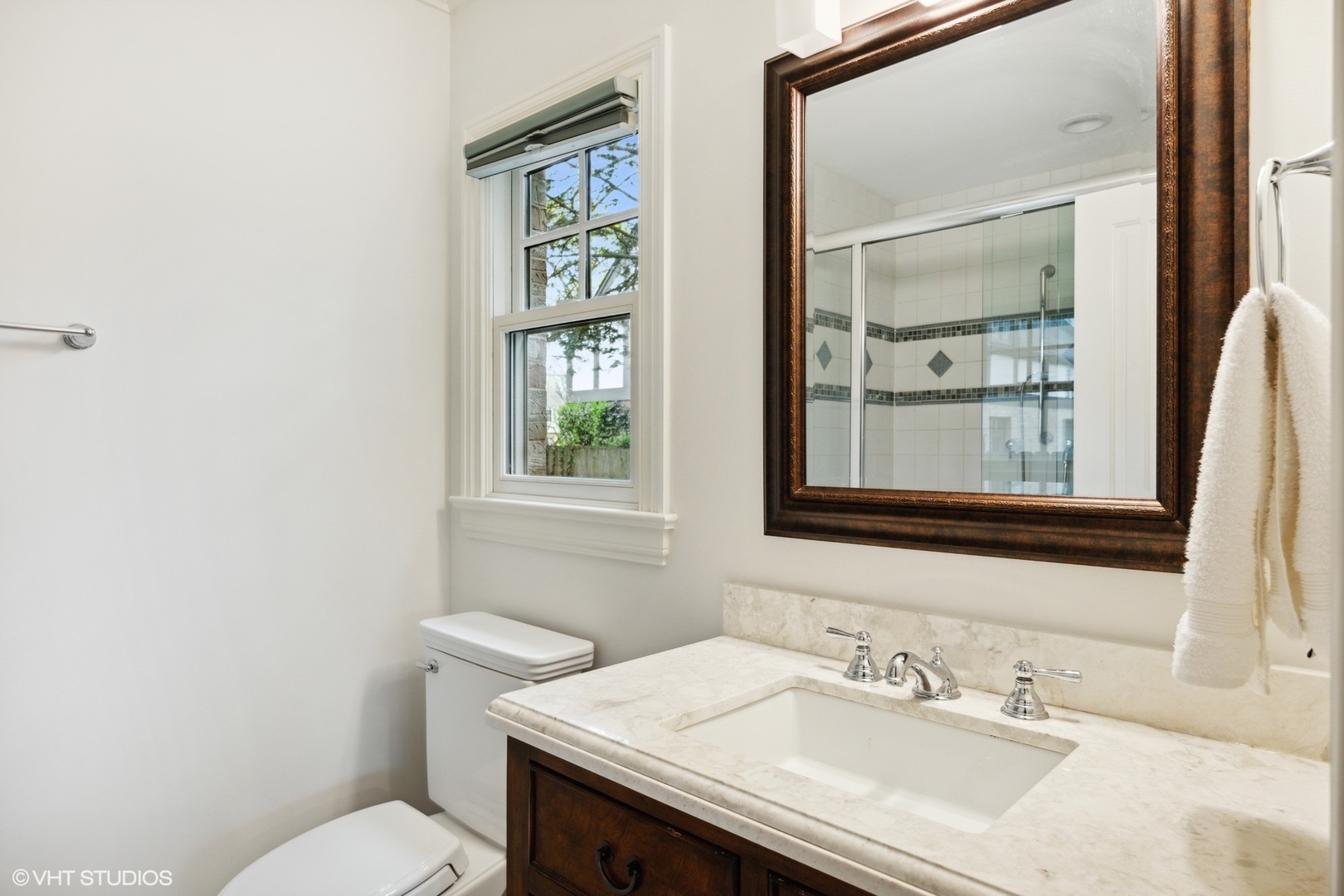 1111 Seneca Road Wilmette, IL 60091 - Photo 16 of 50 a bathroom with a sink and a toilet