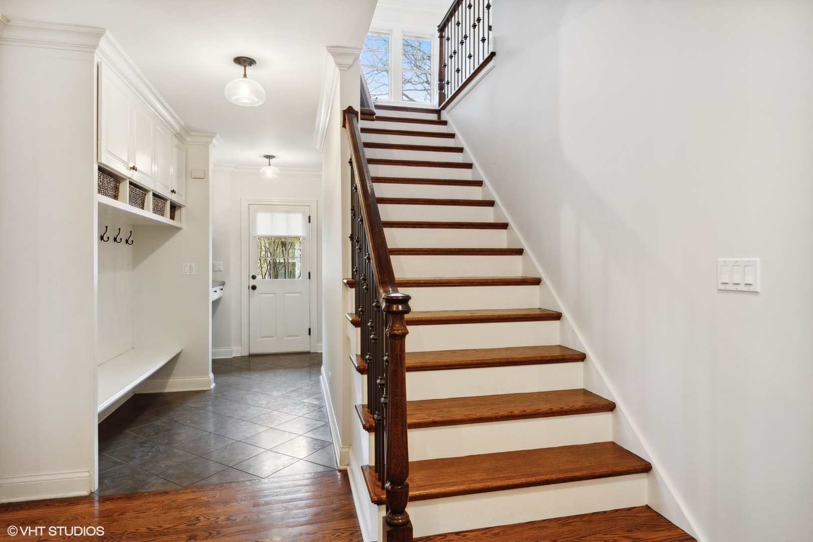 1111 Seneca Road Wilmette, IL 60091 - Photo 19 of 50 a view of entryway and hall with wooden floor
