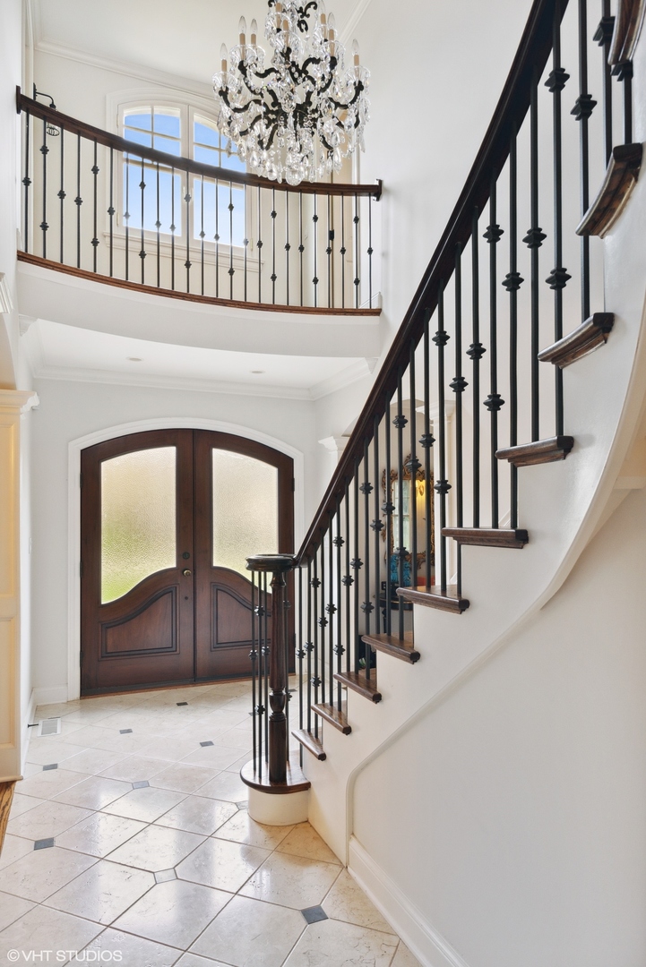 1111 Seneca Road Wilmette, IL 60091 - Photo 20 of 50 a view of staircase with railing and white walls