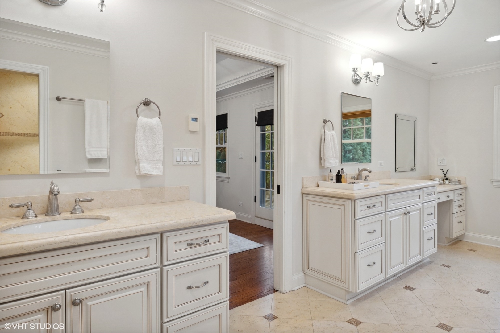 1111 Seneca Road Wilmette, IL 60091 - Photo 25 of 50 a bathroom with a double vanity sink mirror and