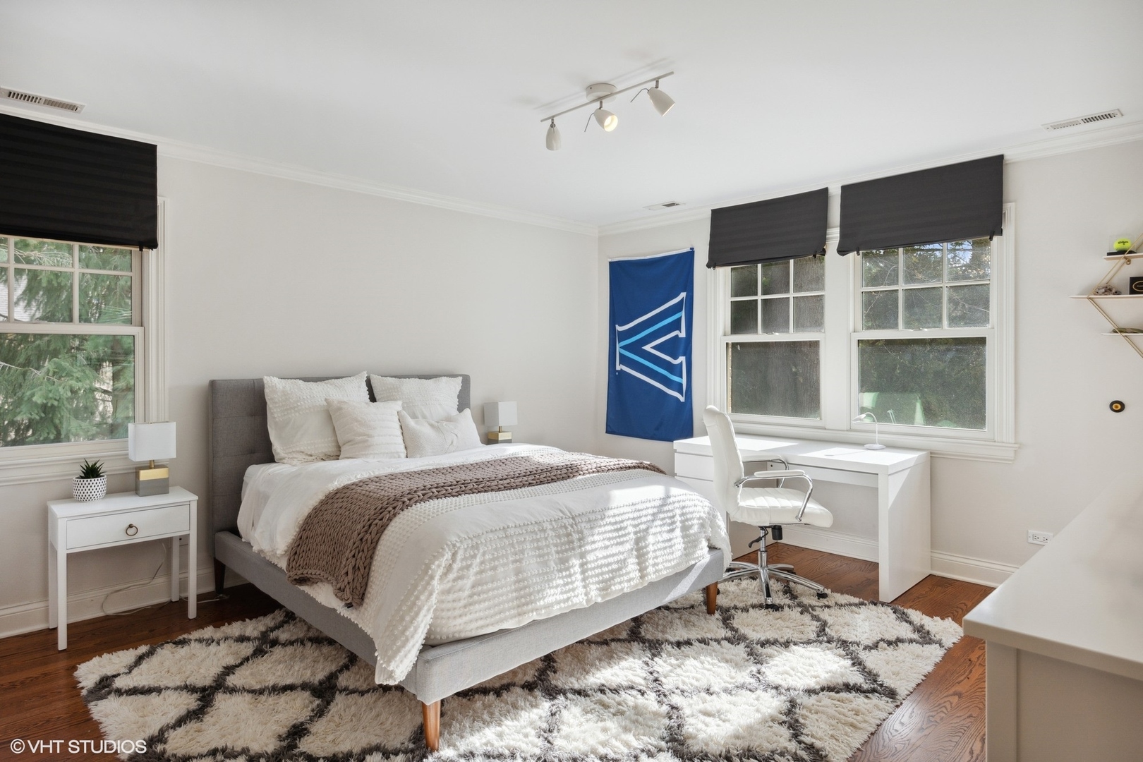 1111 Seneca Road Wilmette, IL 60091 - Photo 27 of 50 a bedroom with a bed and a window