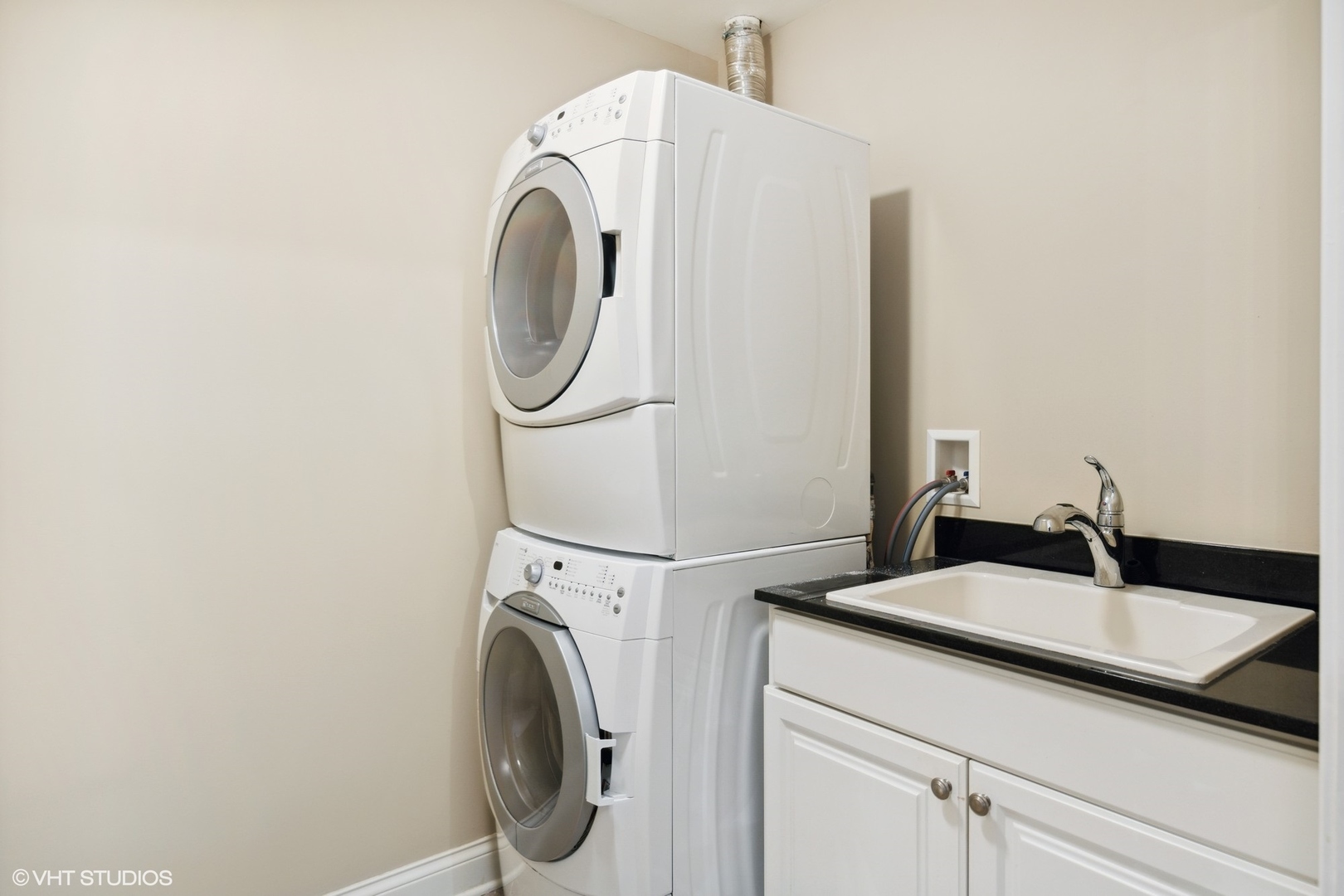 1111 Seneca Road Wilmette, IL 60091 - Photo 34 of 50 a close view of a sink and washer and dryer