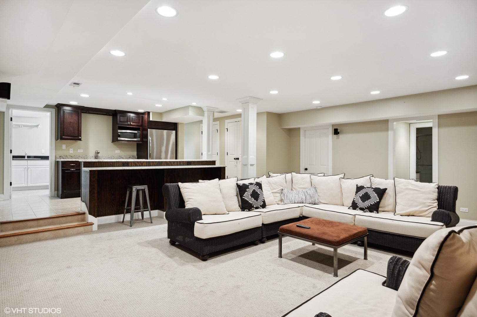 1111 Seneca Road Wilmette, IL 60091 - Photo 37 of 50 a living room with furniture and a kitchen