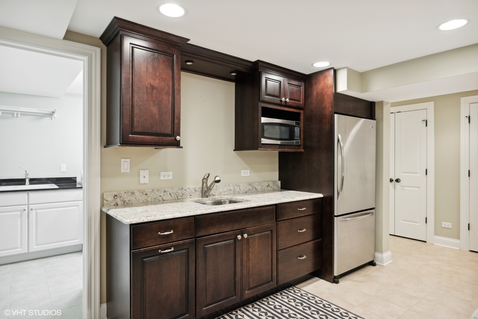 1111 Seneca Road Wilmette, IL 60091 - Photo 39 of 50 a kitchen with a refrigerator and a sink