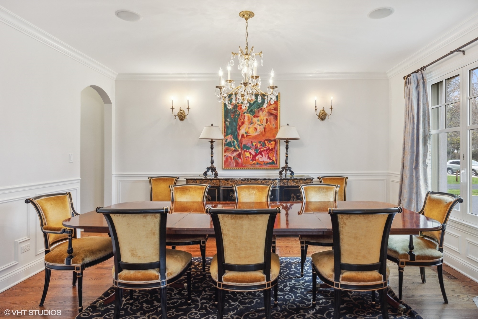 1111 Seneca Road Wilmette, IL 60091 - Photo 5 of 50 a dining room table chairs and a chandelier