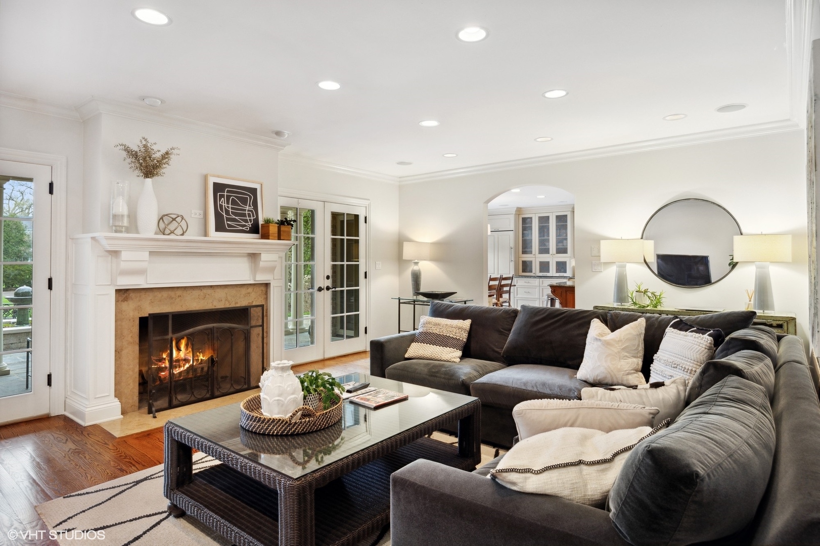 1111 Seneca Road Wilmette, IL 60091 - Photo 6 of 50 a living room with furniture and a fireplace