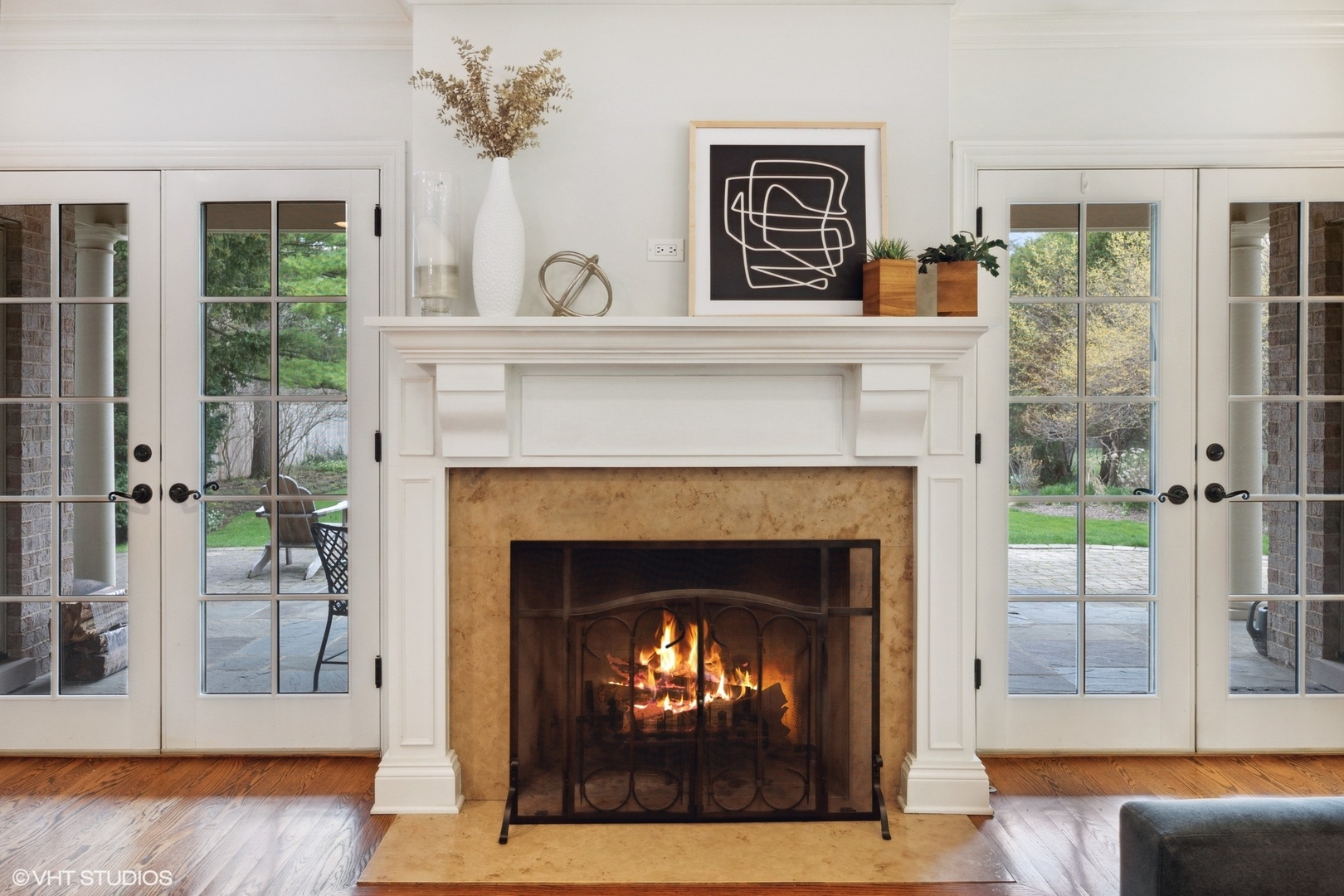 1111 Seneca Road Wilmette, IL 60091 - Photo 8 of 50 a living room with furniture and a fireplace