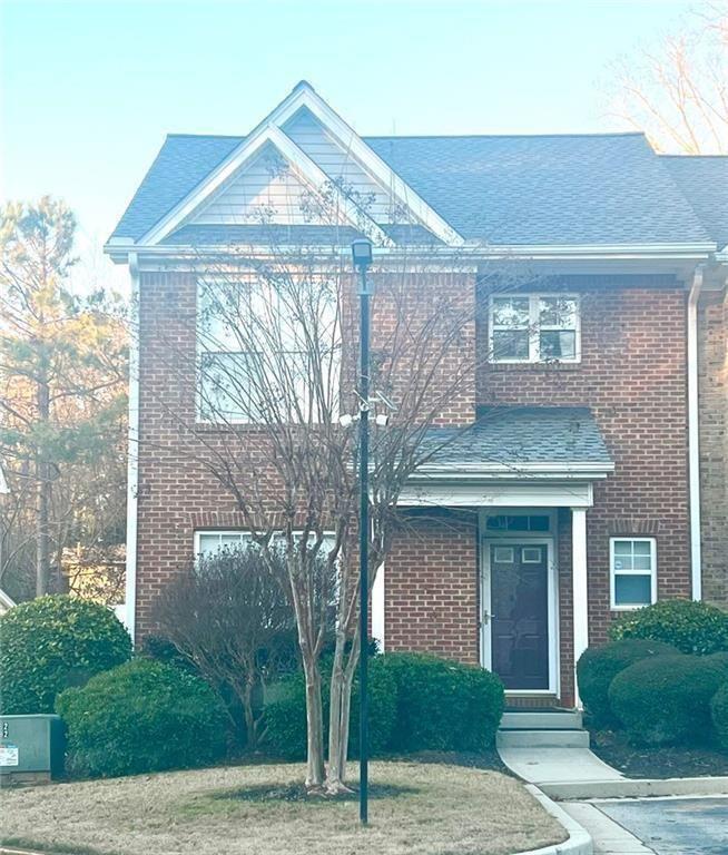 3854 Austin Park Lane Decatur, GA 30032 - Photo 40 of 44 a front view of a house with garden